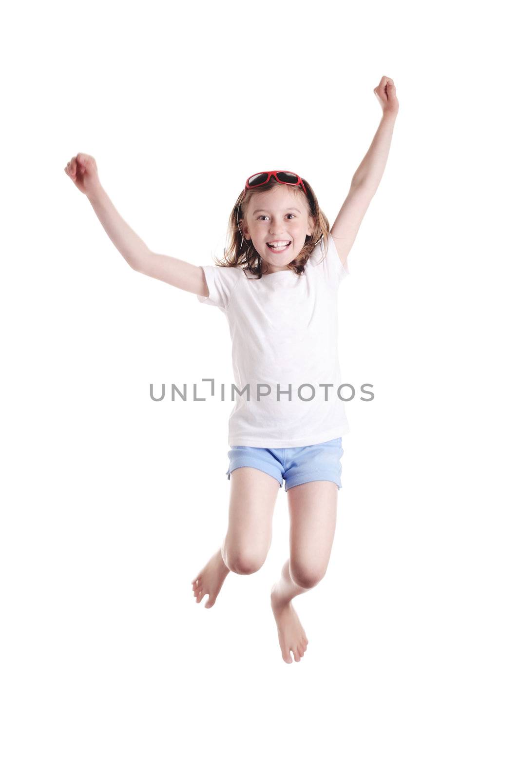 cute little girl jumping on white background