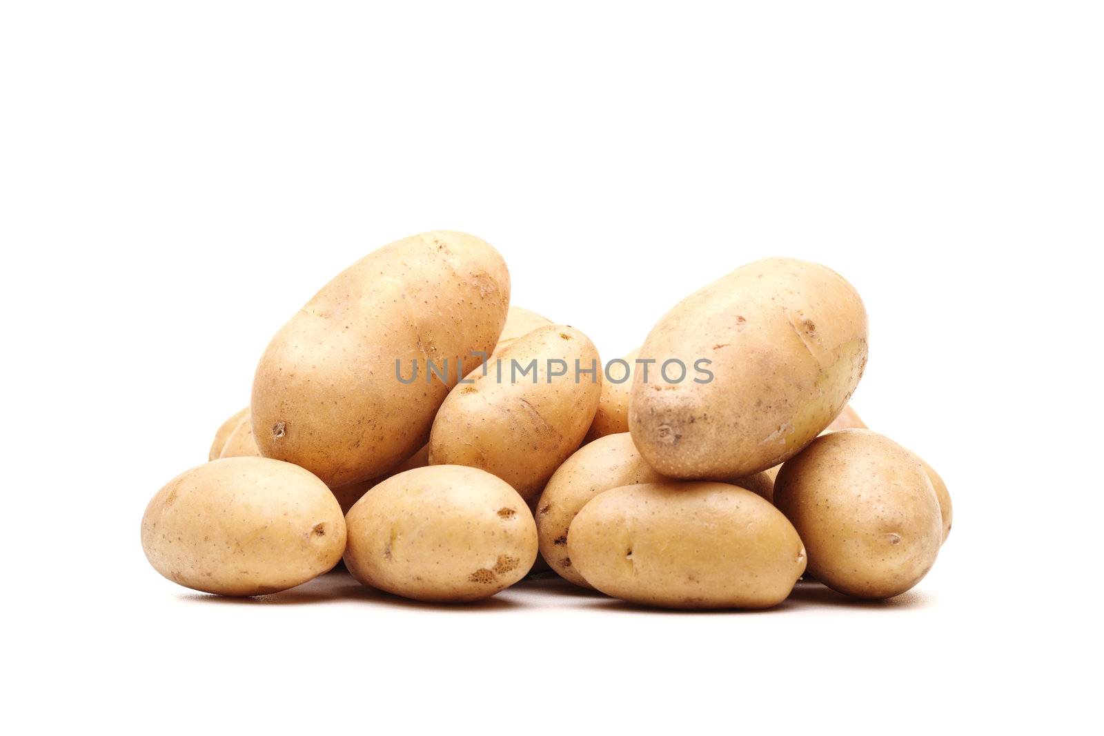 bunch of fresh potatoes against white