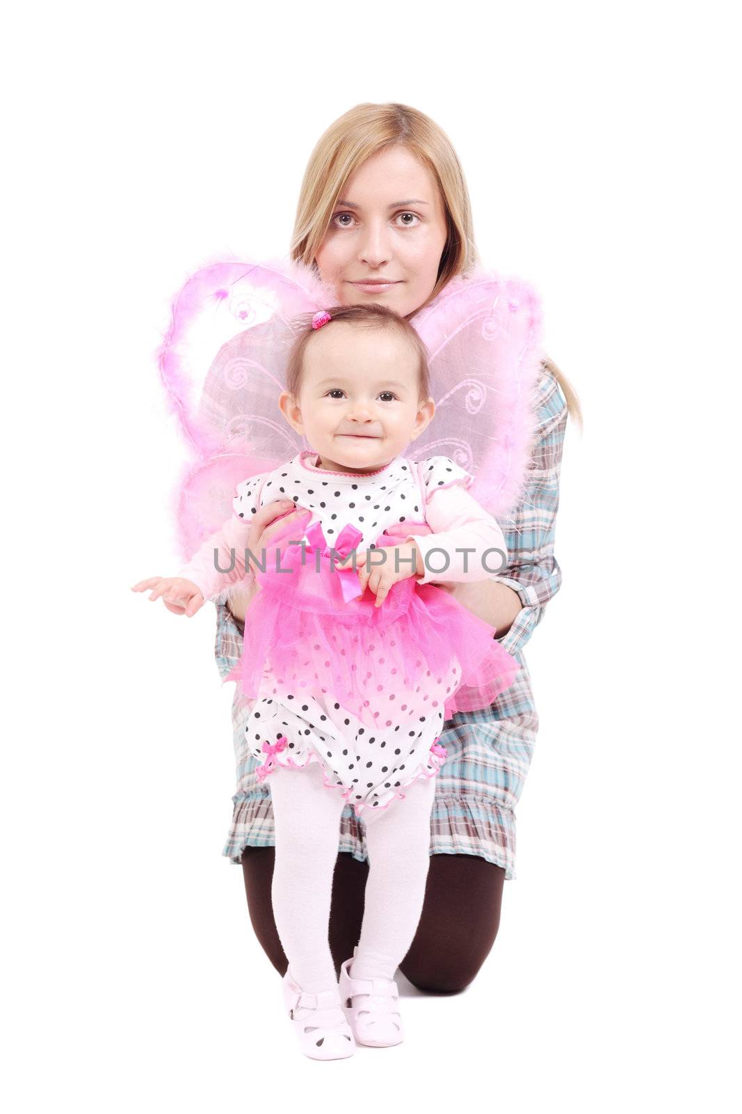 mother with her baby girl in pink butterfly outfit