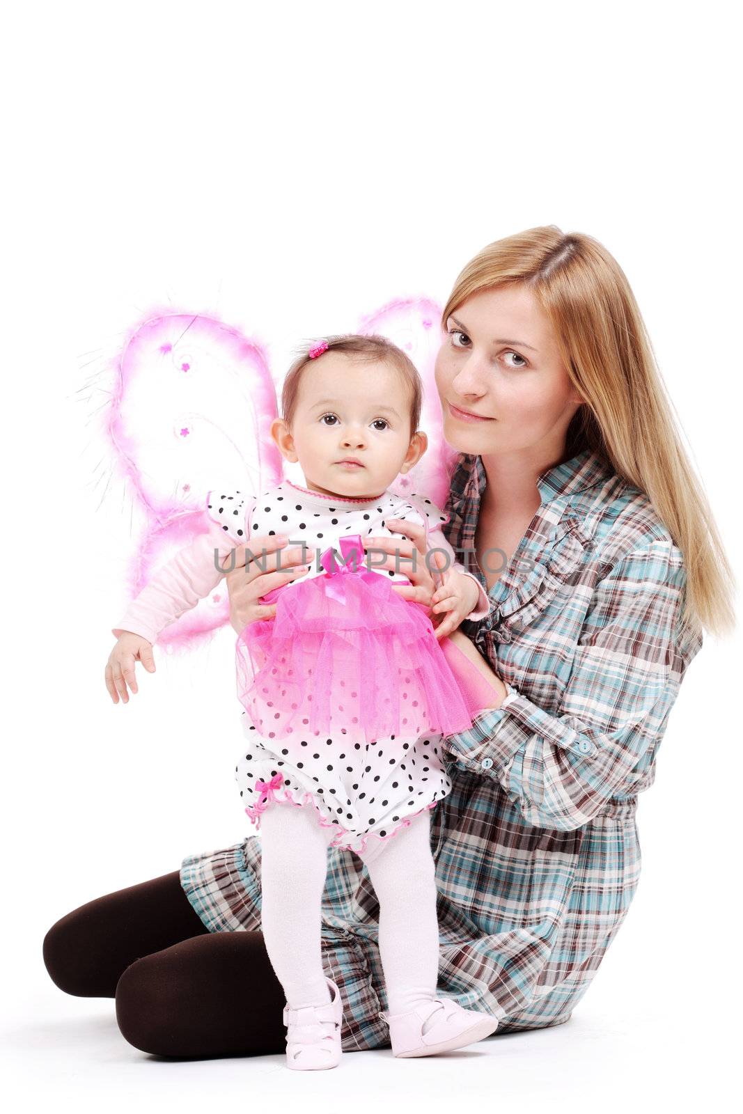 mother with her baby girl in pink butterfly outfit