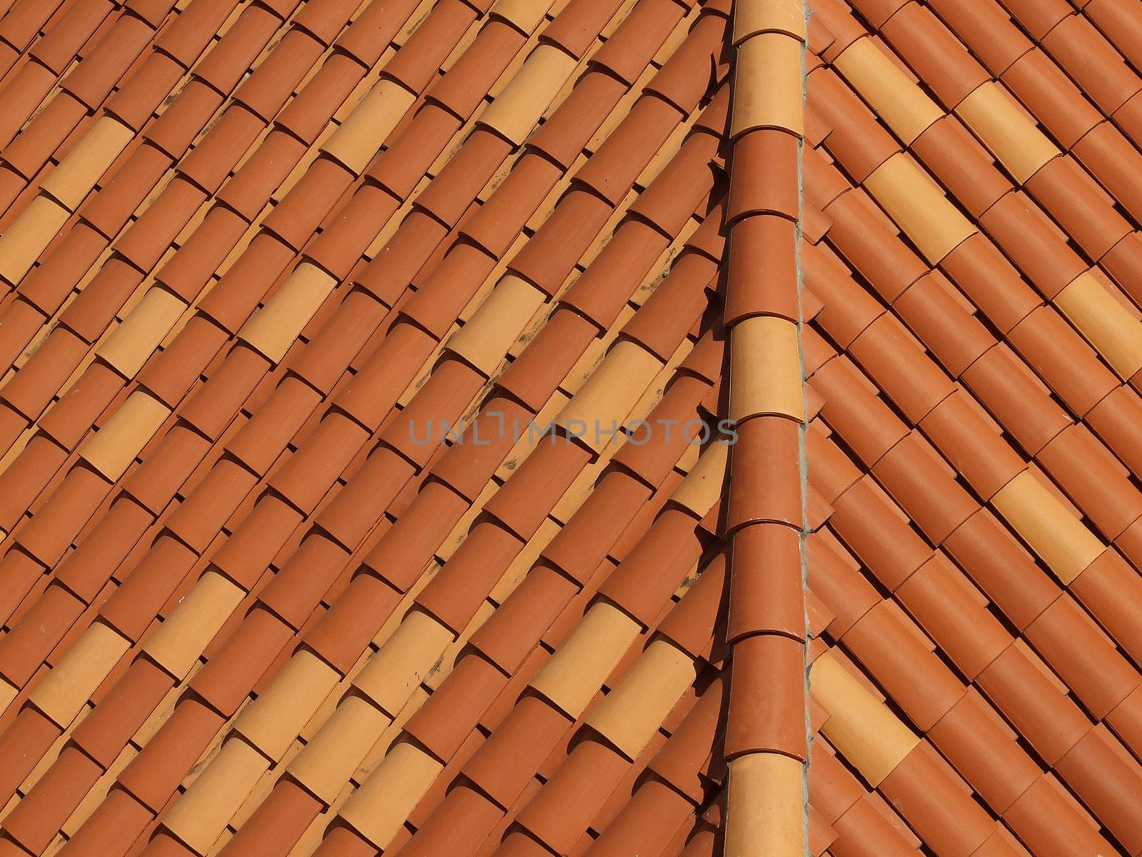 Roof covering of ceramic rustic tiles, aerial view, background