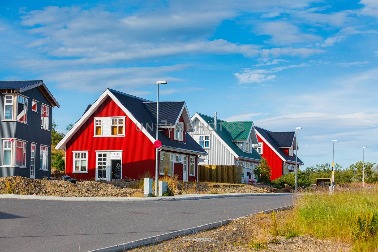 Beautiful houses in Iceland. Blue sky in background.