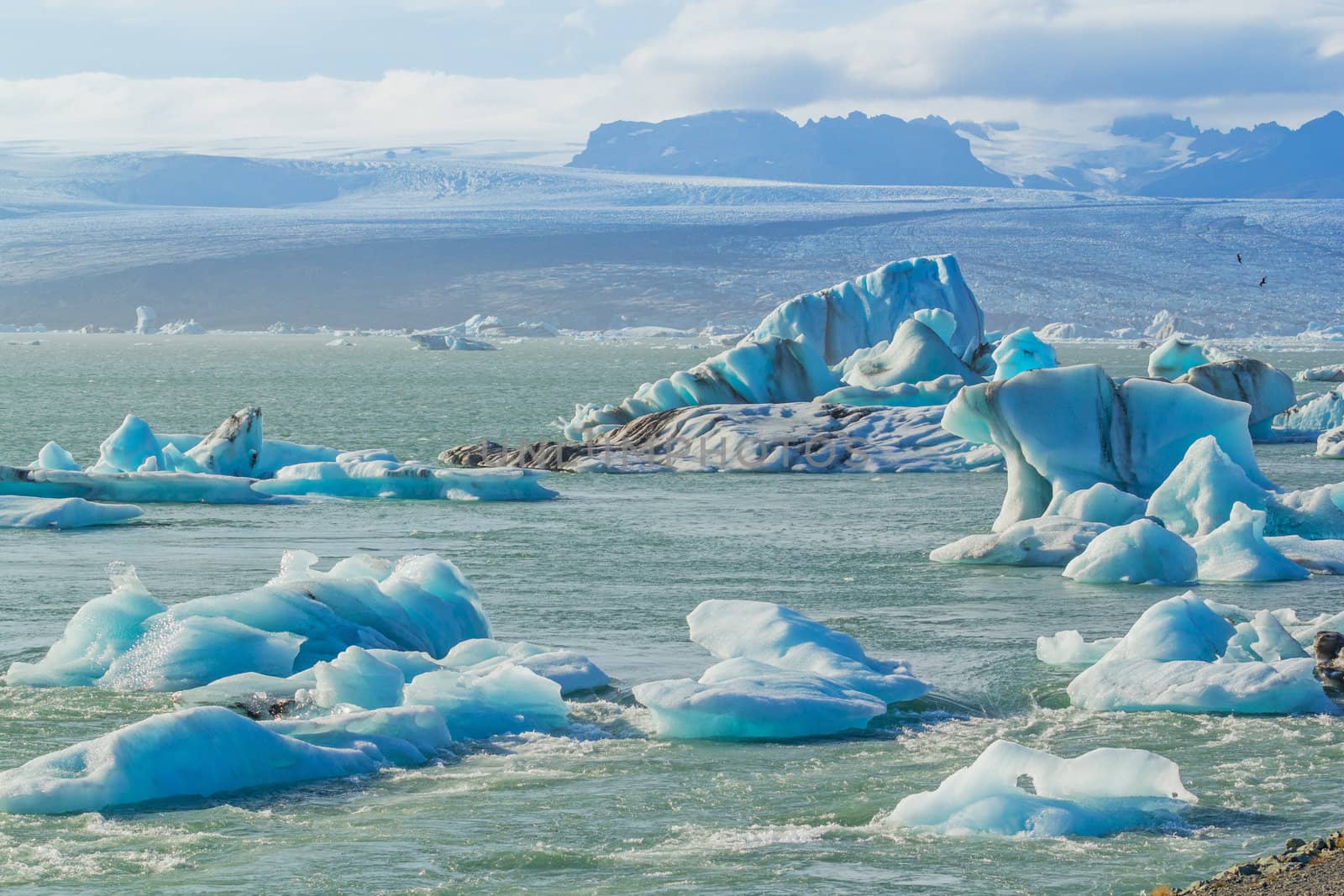 Icebergs in the glacier lake Jokulsarlon, glacier Vatnajokull, Iceland.