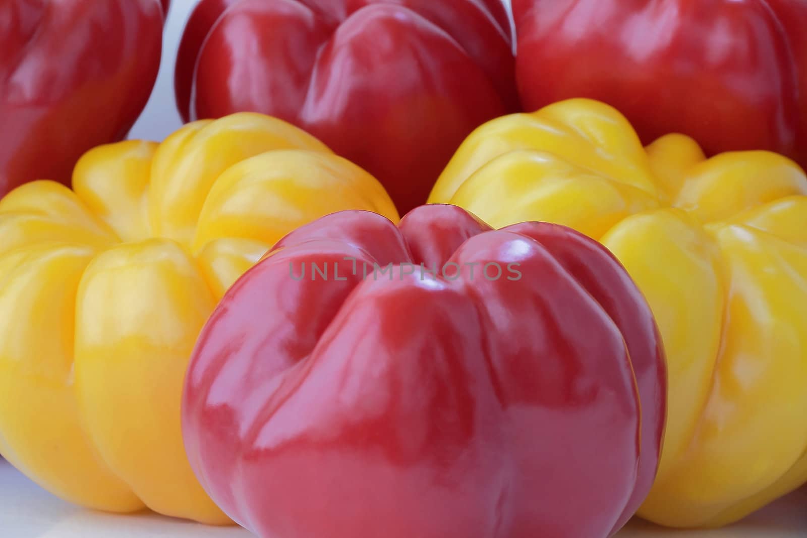 Image of red and yellow raw pepper