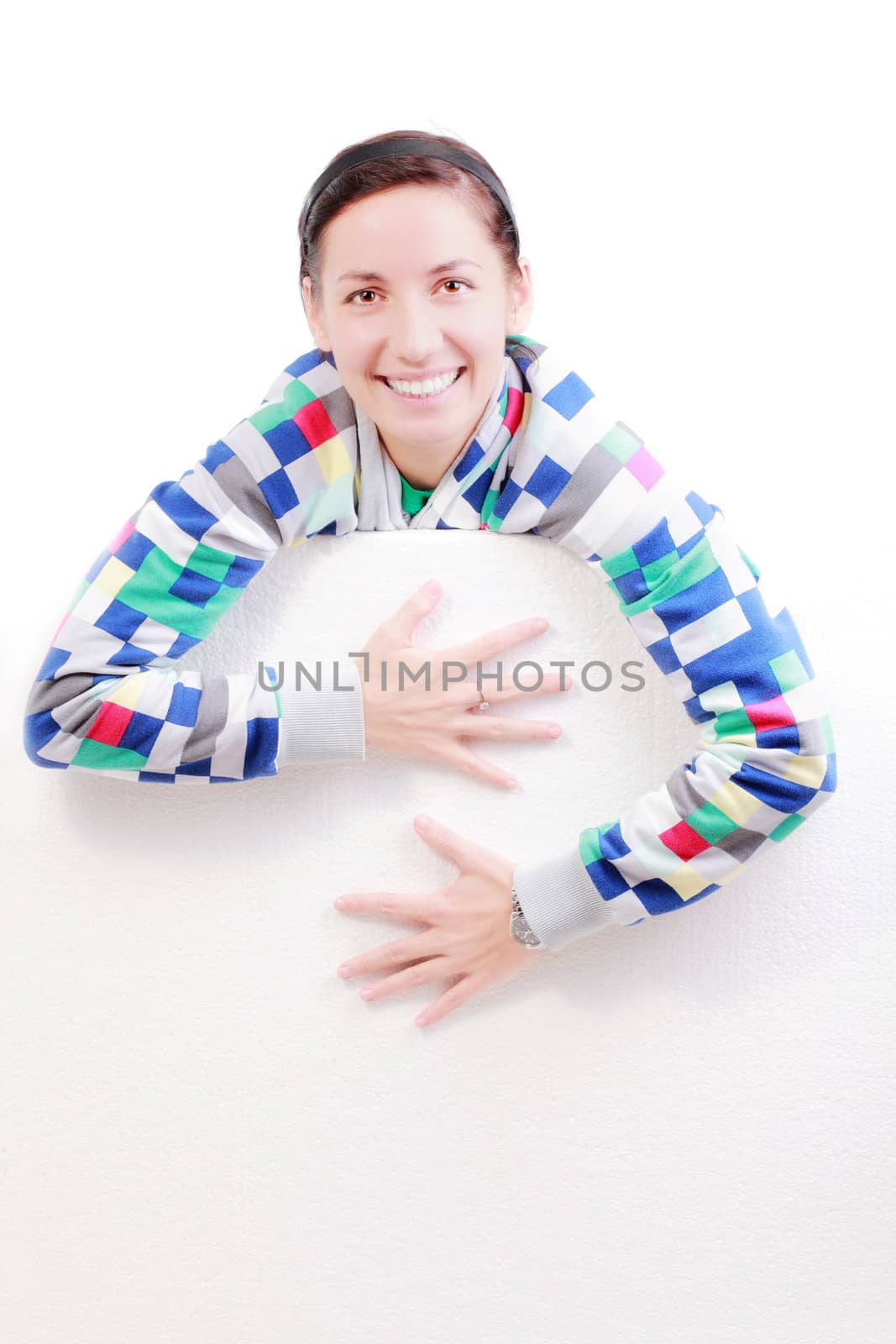 happy girl holding white styrofoam, against white