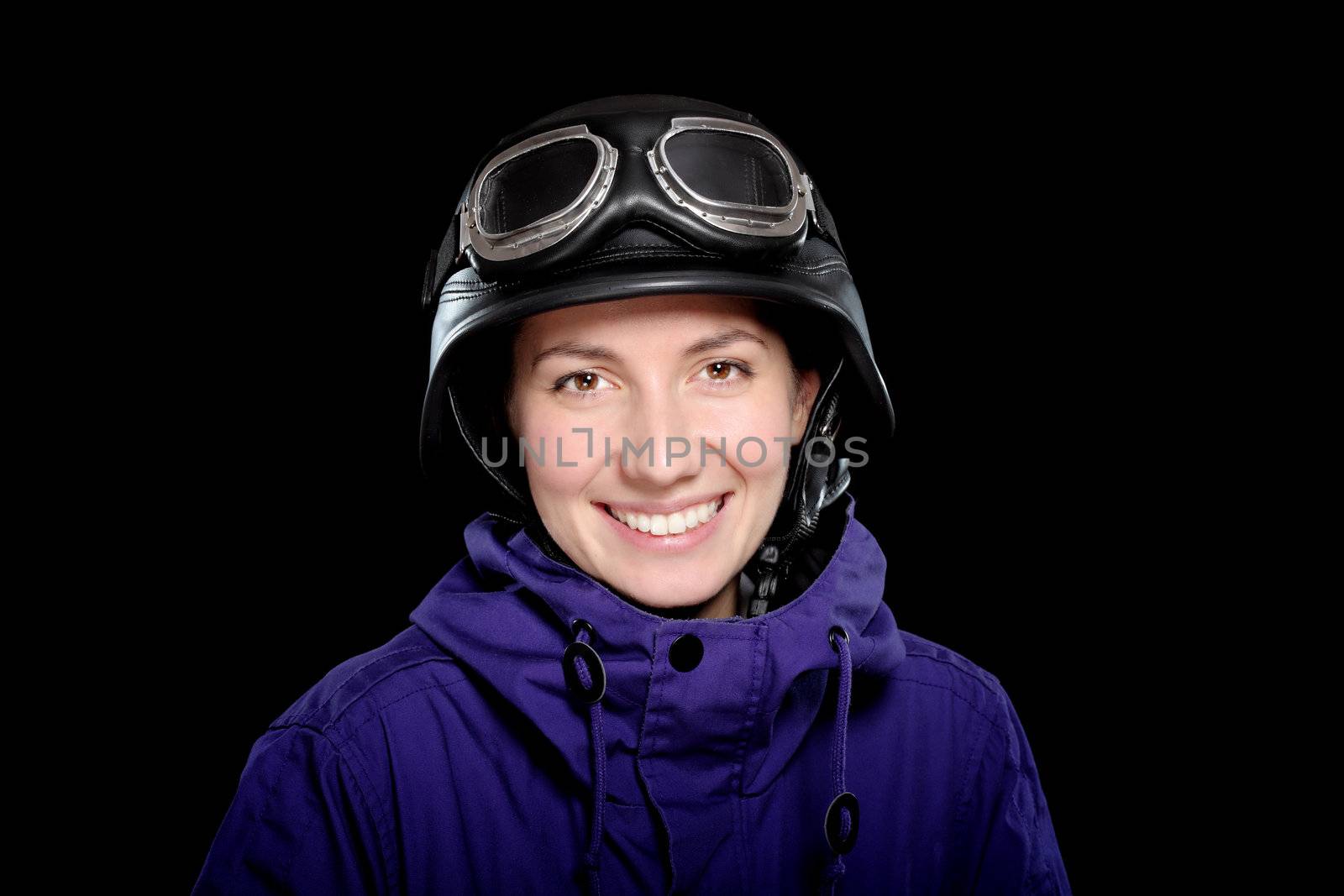 girl with us-army style helmet and goggles, on black