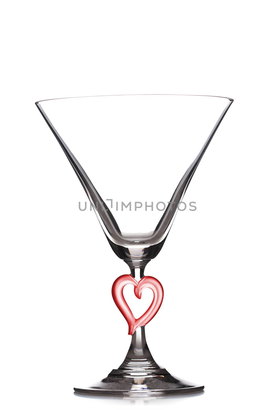 empty martini heart shaped glass, isolated on white