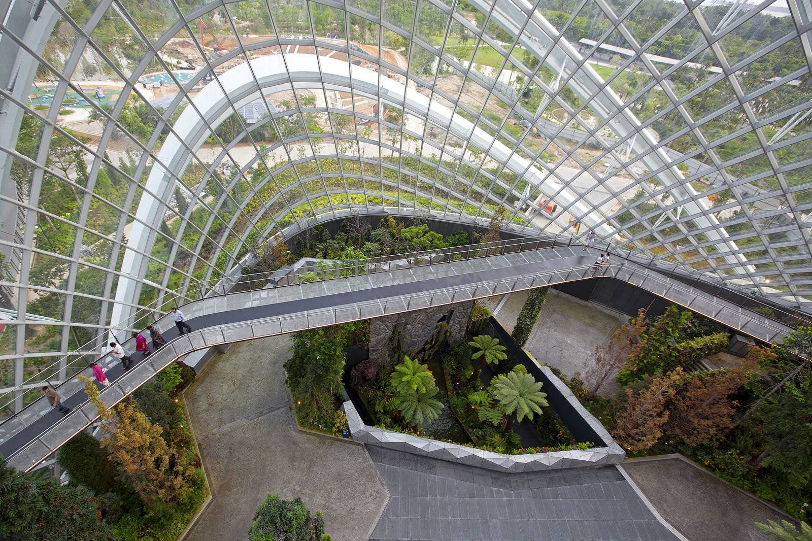 SINGAPORE - JAN 23: Enormous Conservatory "Flower Dome" at Gardens by the Bay on Jan 23, 2013 in Singapore. It replicates the cool-dry climate of Mediterranean regions.