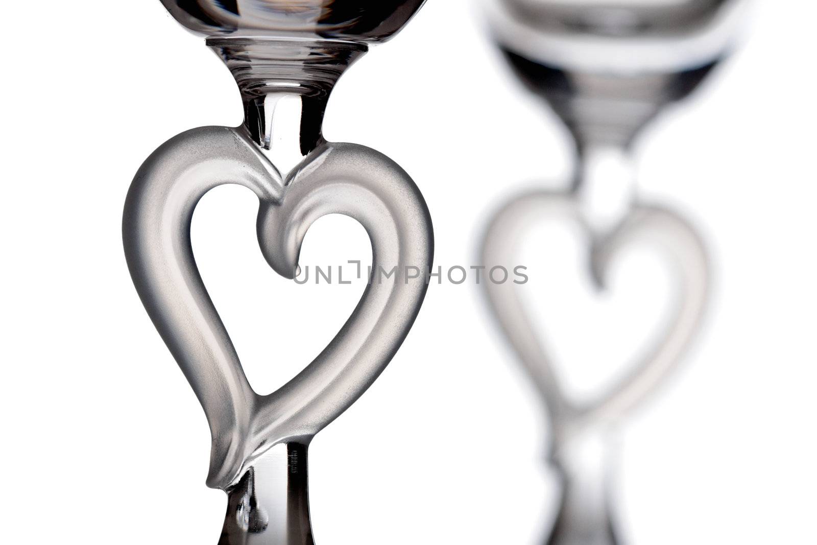 couple of glass hearts, isolated on white
