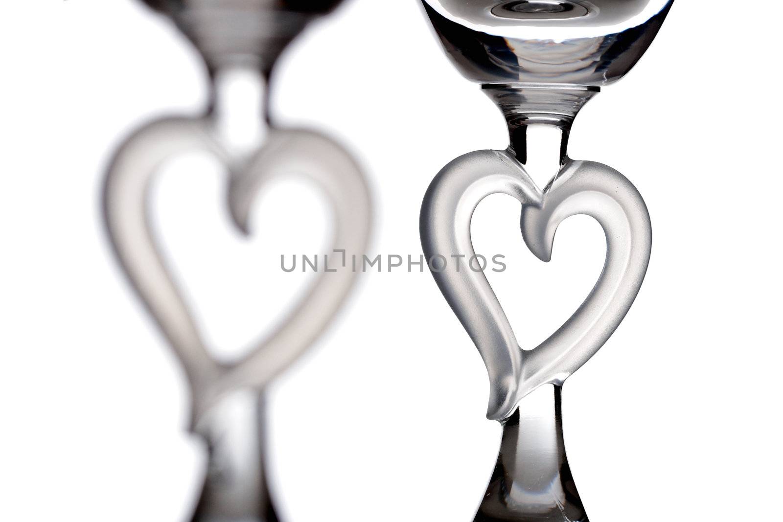 couple of glass hearts, isolated on white
