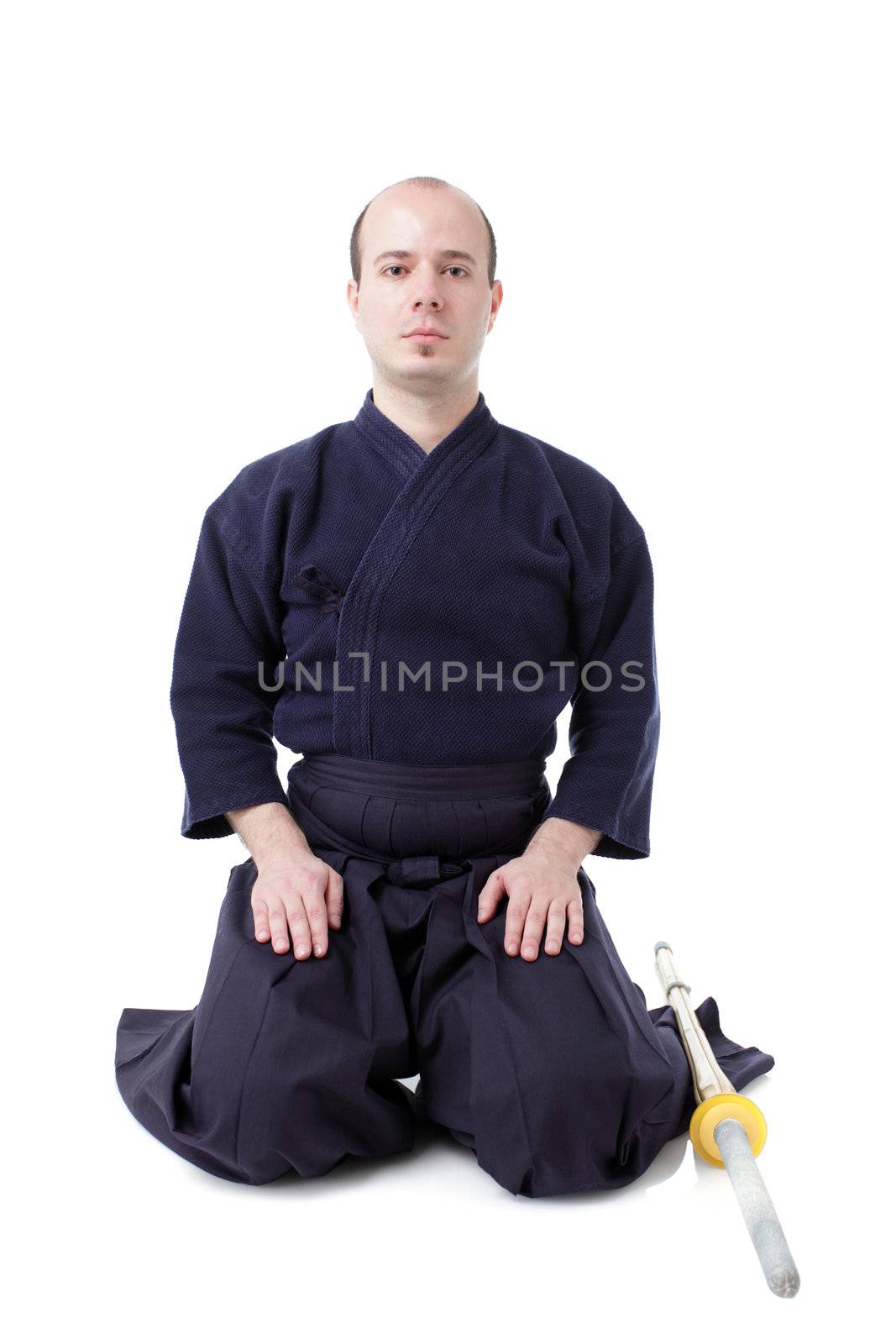 kendo fighter with shinai isolated on white