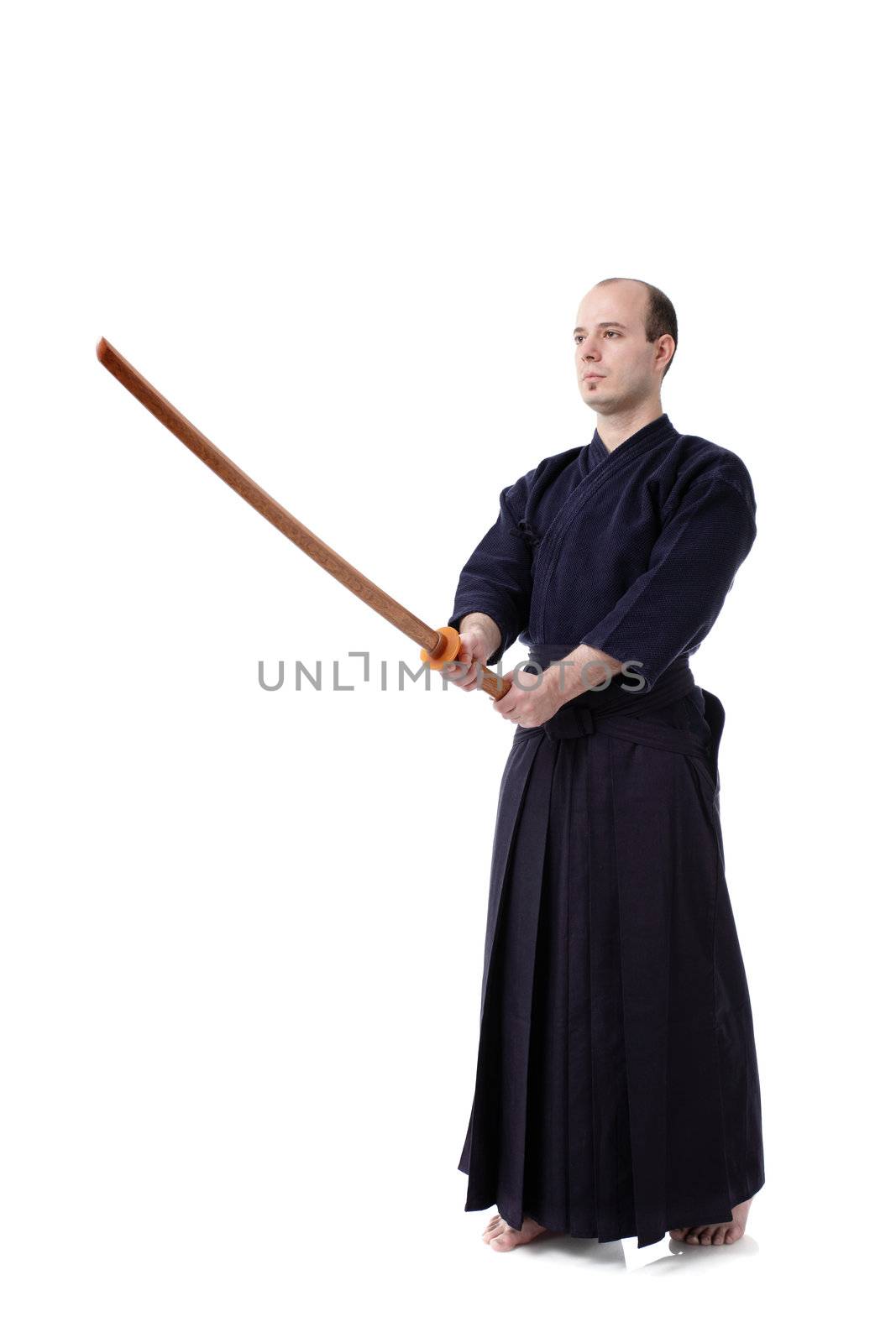 kendo fighter with bokken isolated on white