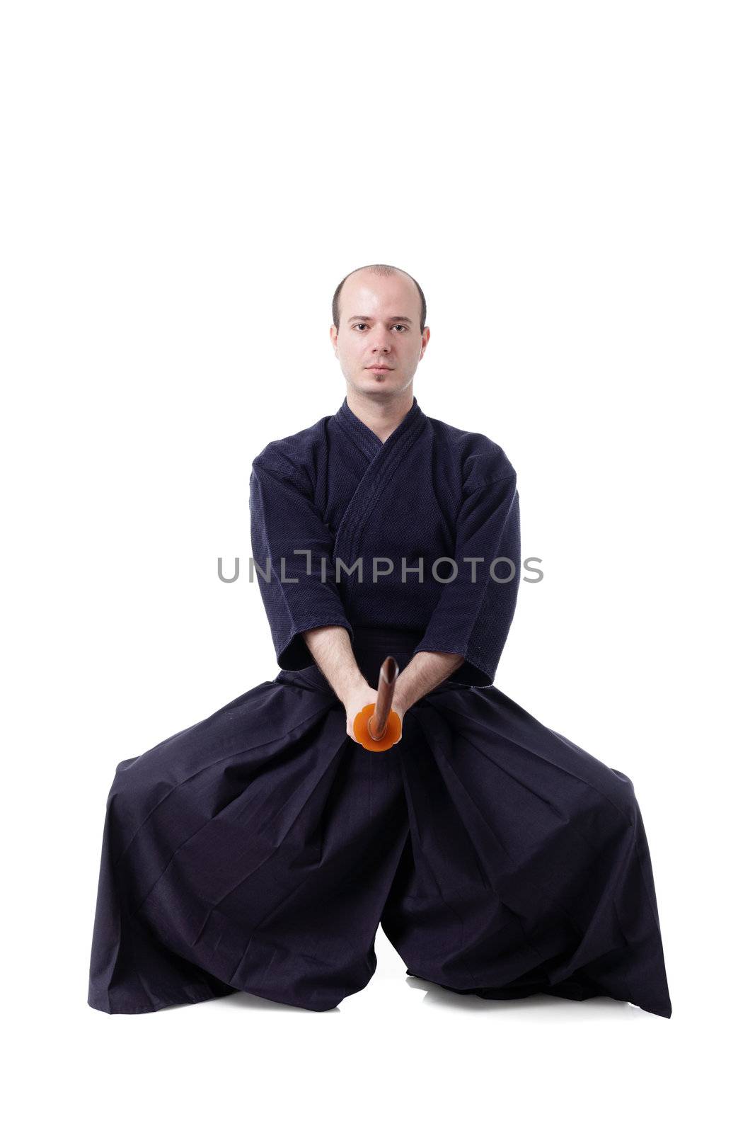 kendo fighter with bokken isolated on white
