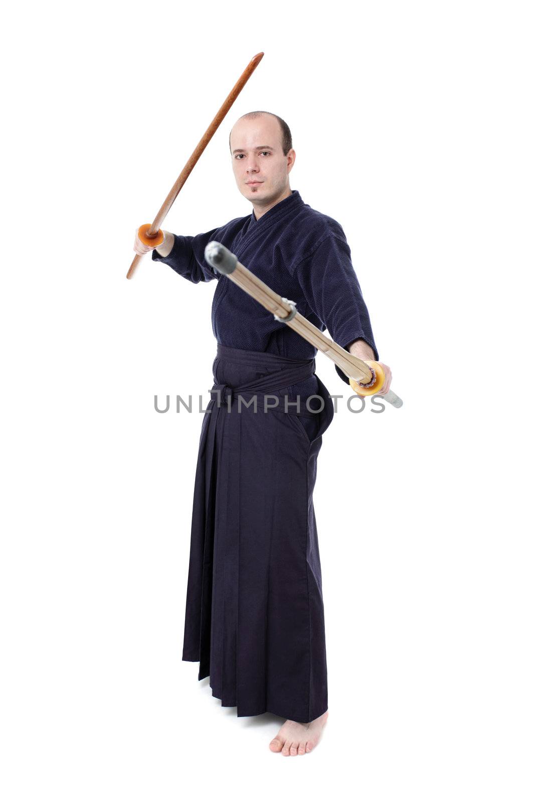 kendo fighter with bokken and shinai isolated on white