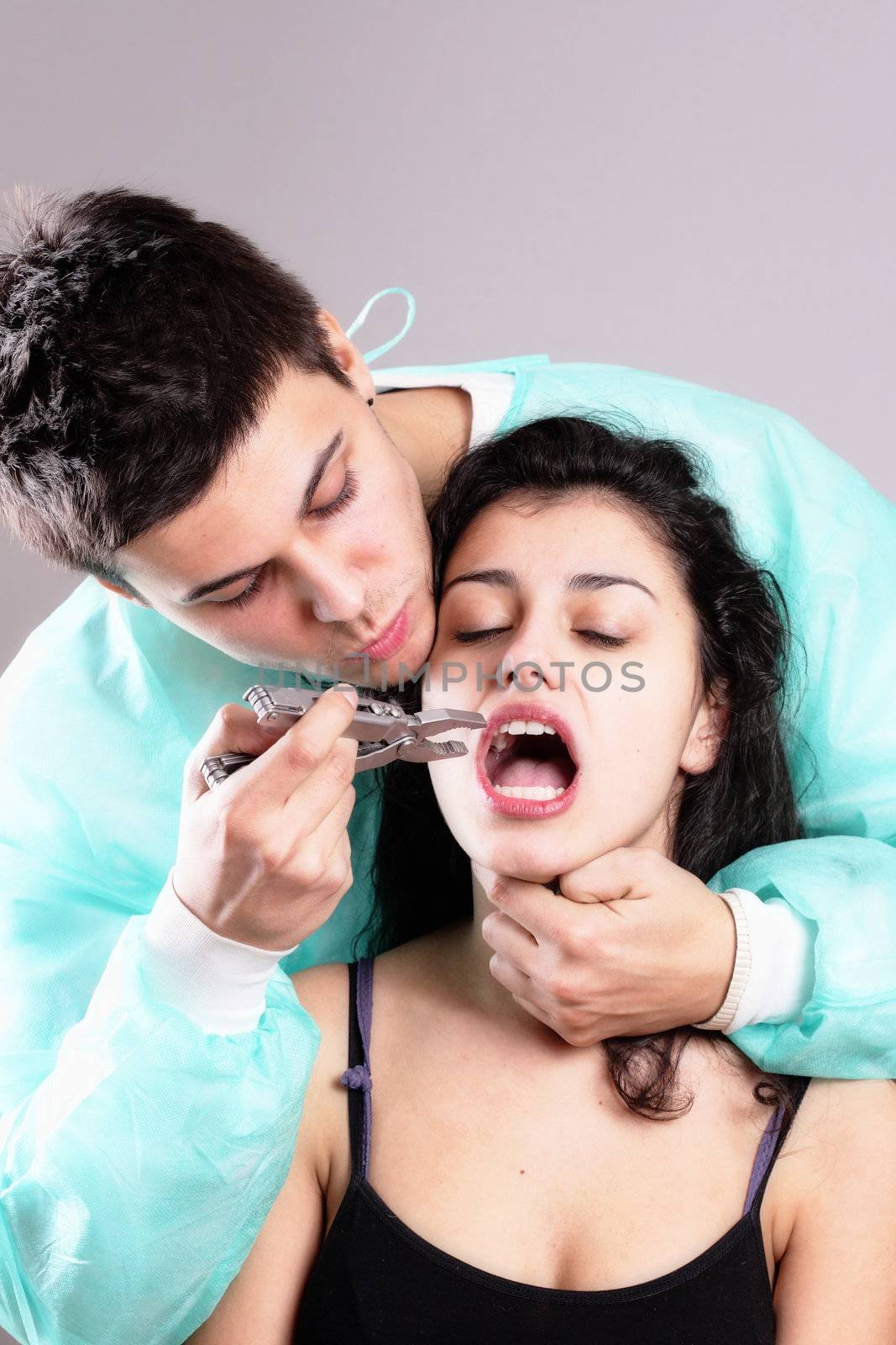 portrait of a dentist and a female patient