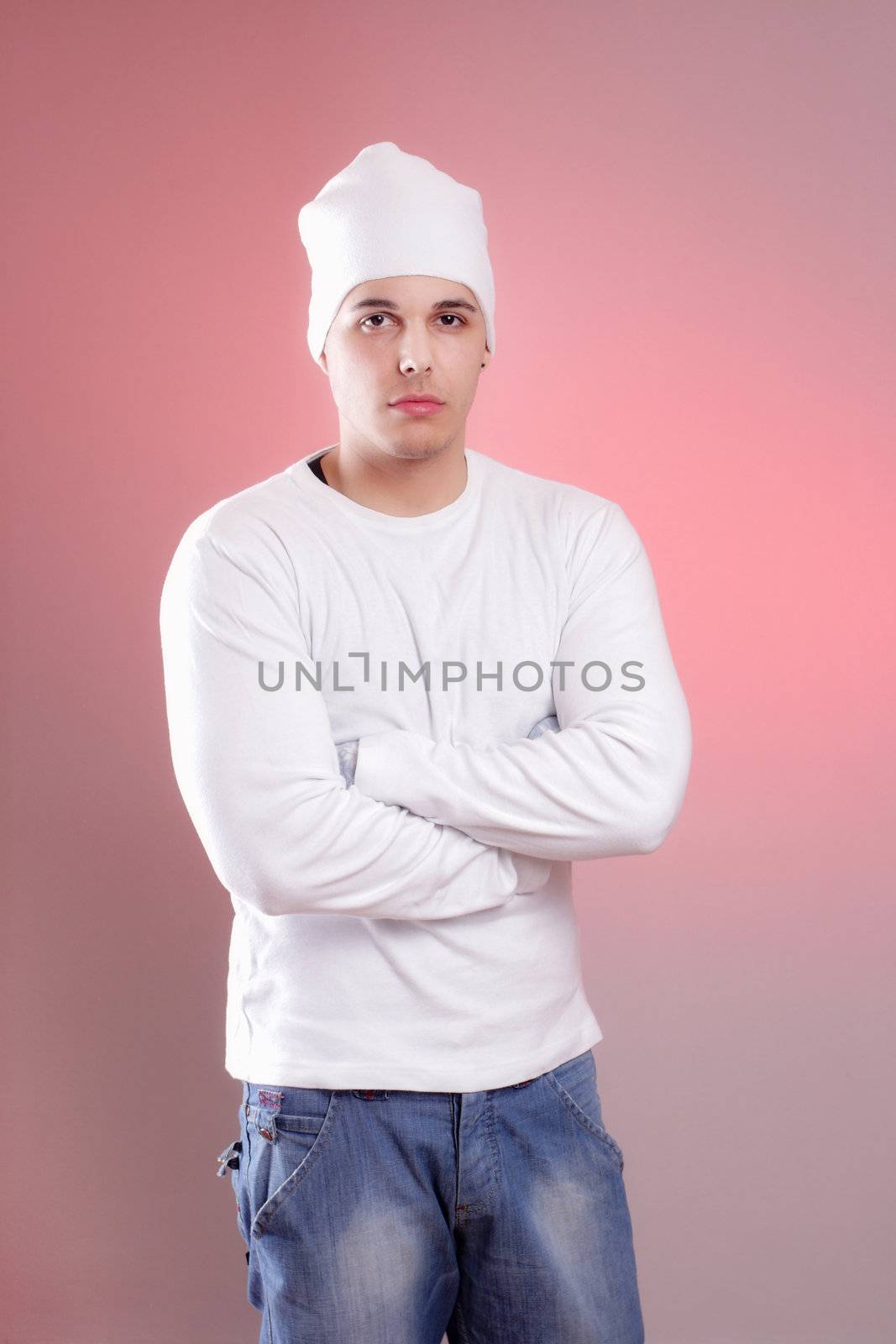 portrait of a young man on colored background