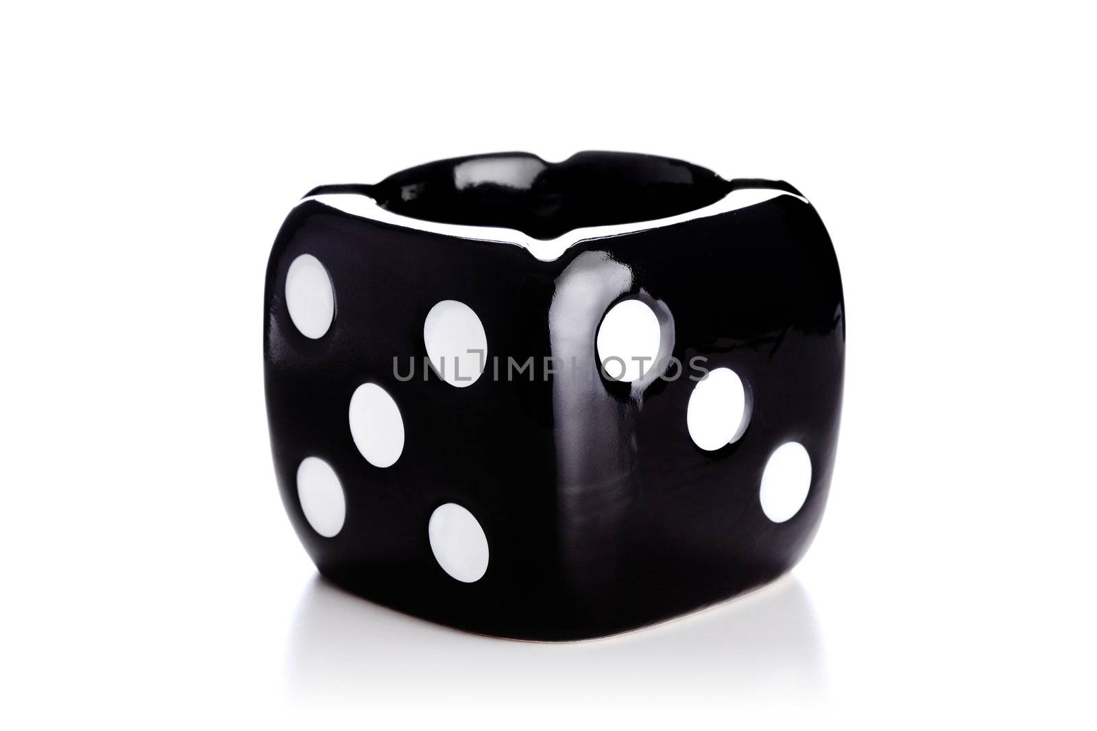 dice shaped black ash tray against white