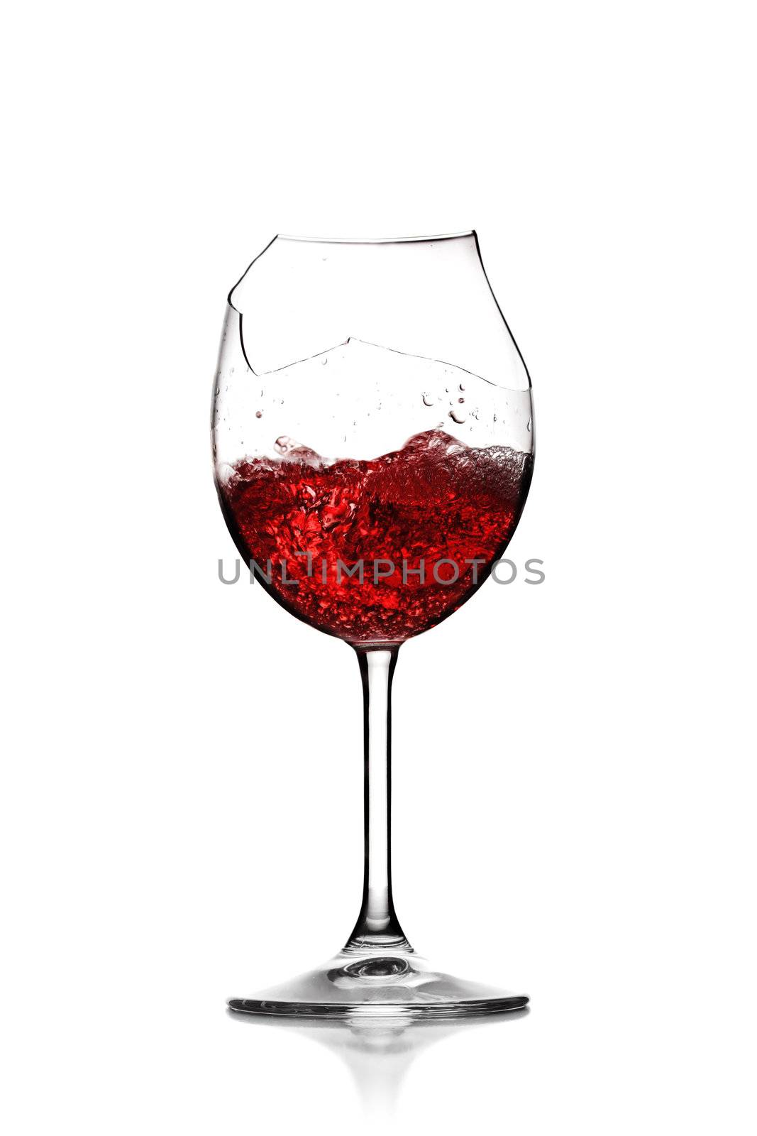 red wine in broken glass by kokimk