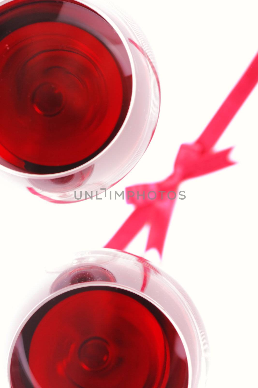 abstract red wine glasses and a ribbon bow