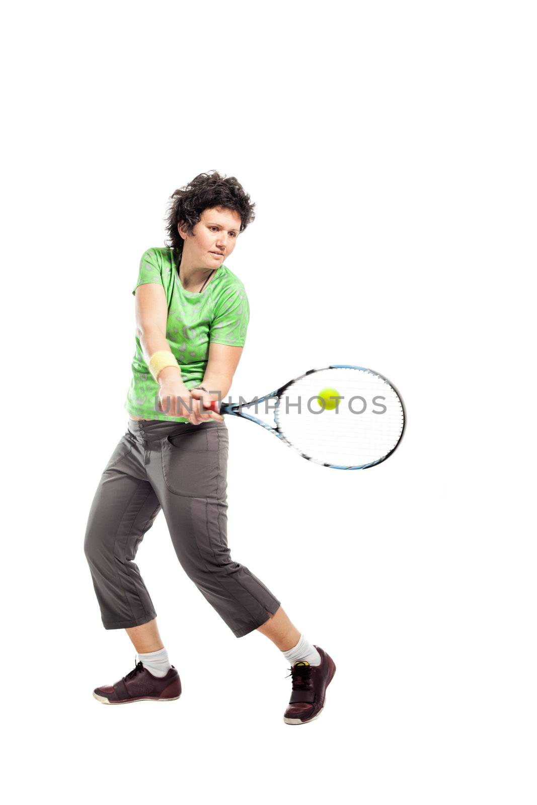 Casual female tennis player isolated on white background