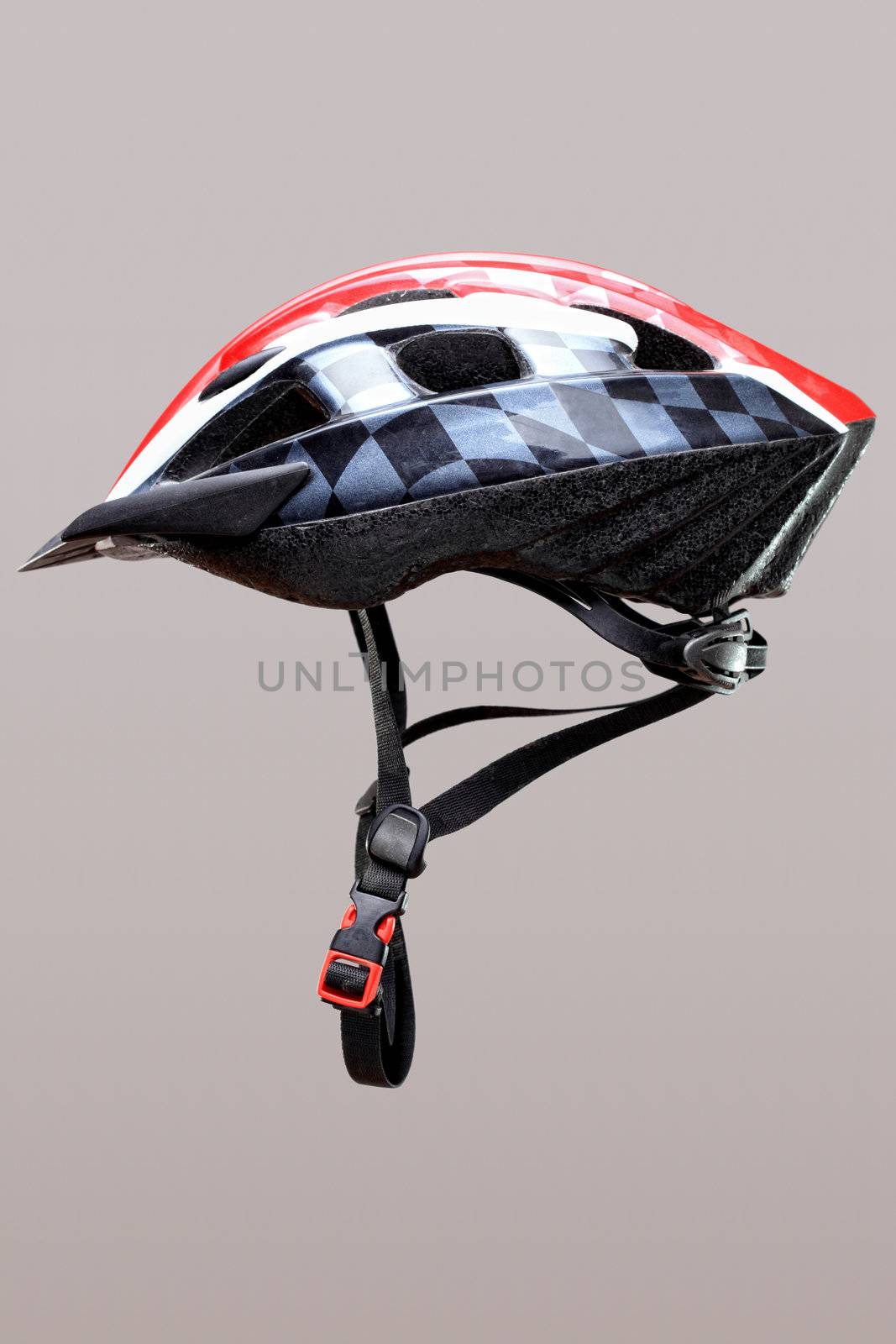 mountain bike helmet, floating on gray background