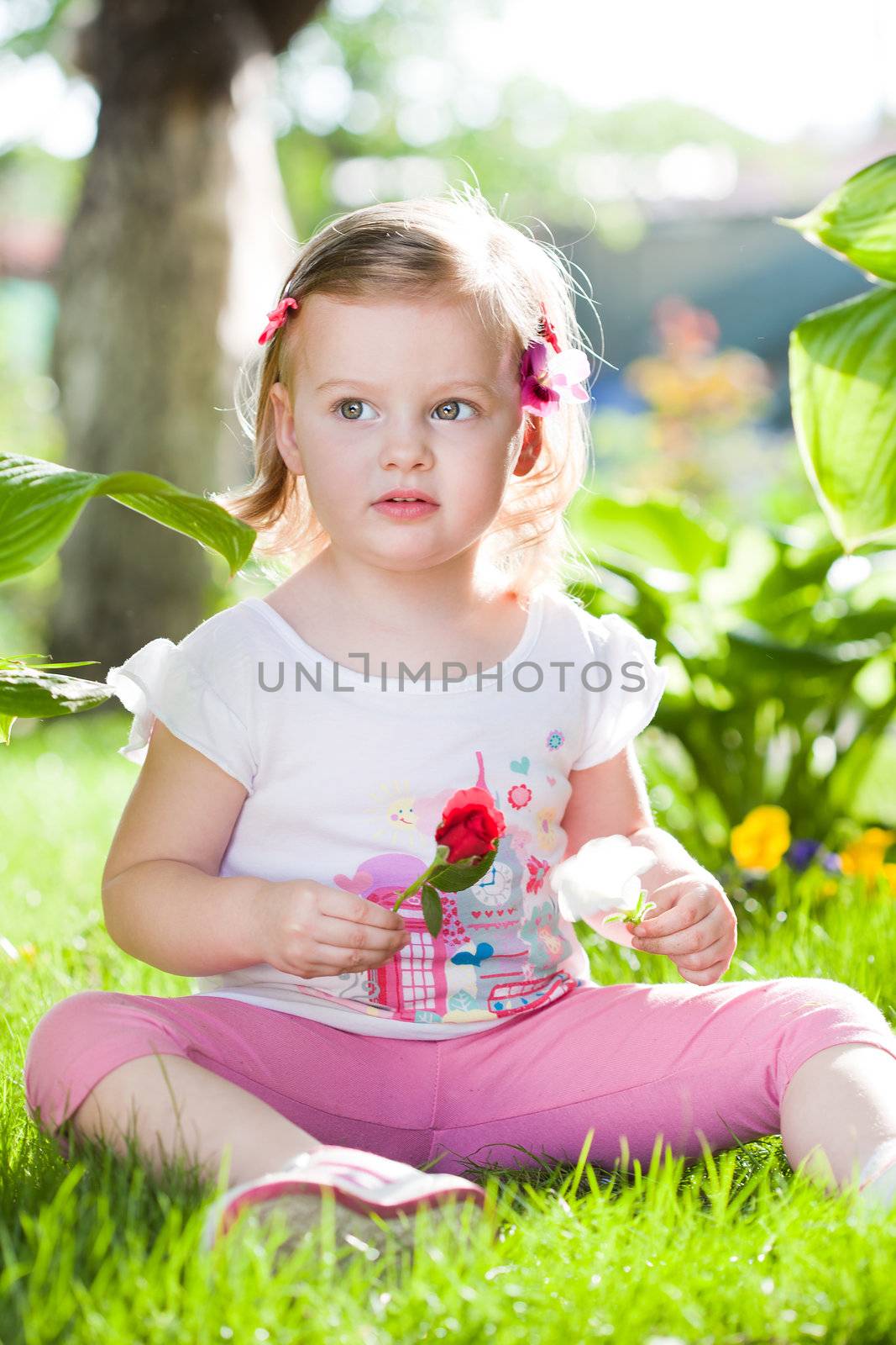 cute little girl playing in the nature