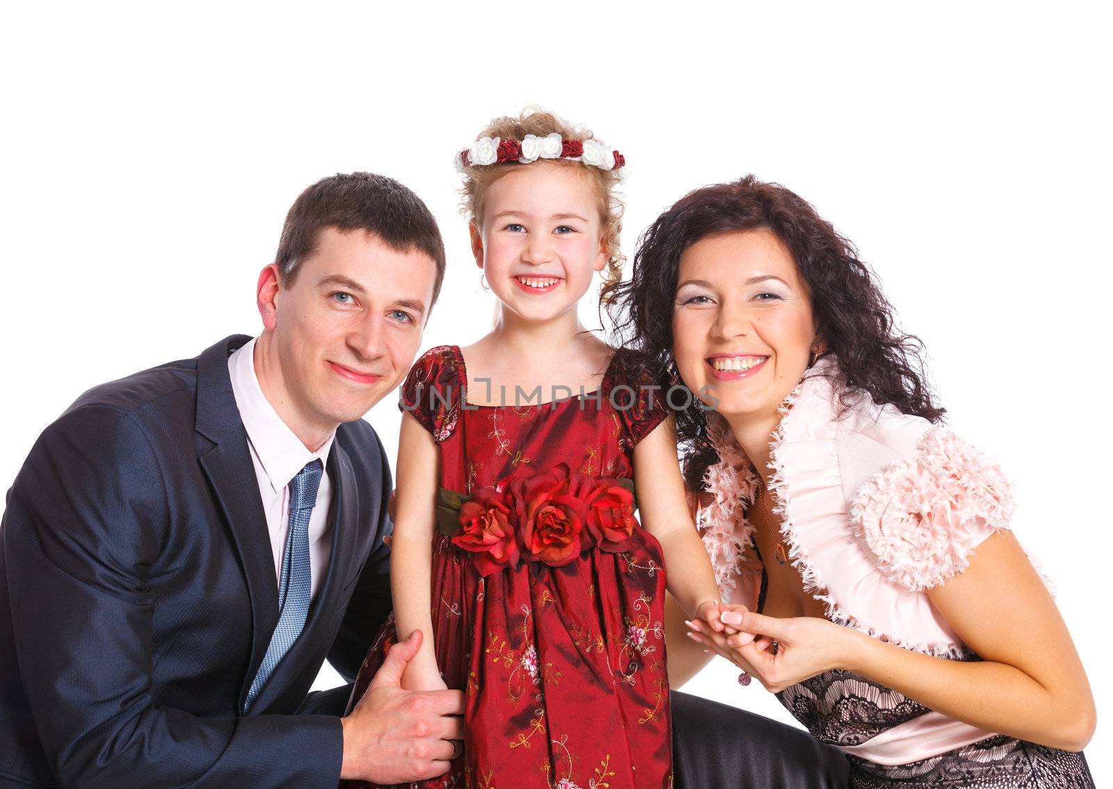 Beautiful middle aged couple with cute daughter smiling over white background