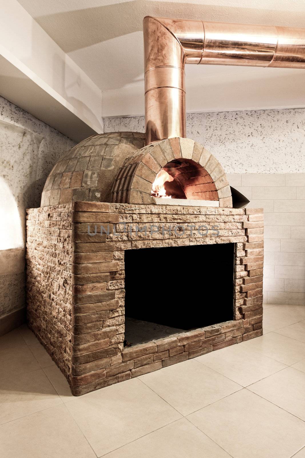wood fired oven in a reataurant interior