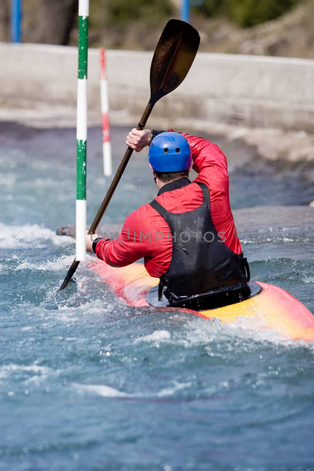 kayaker manoeuvring in white water