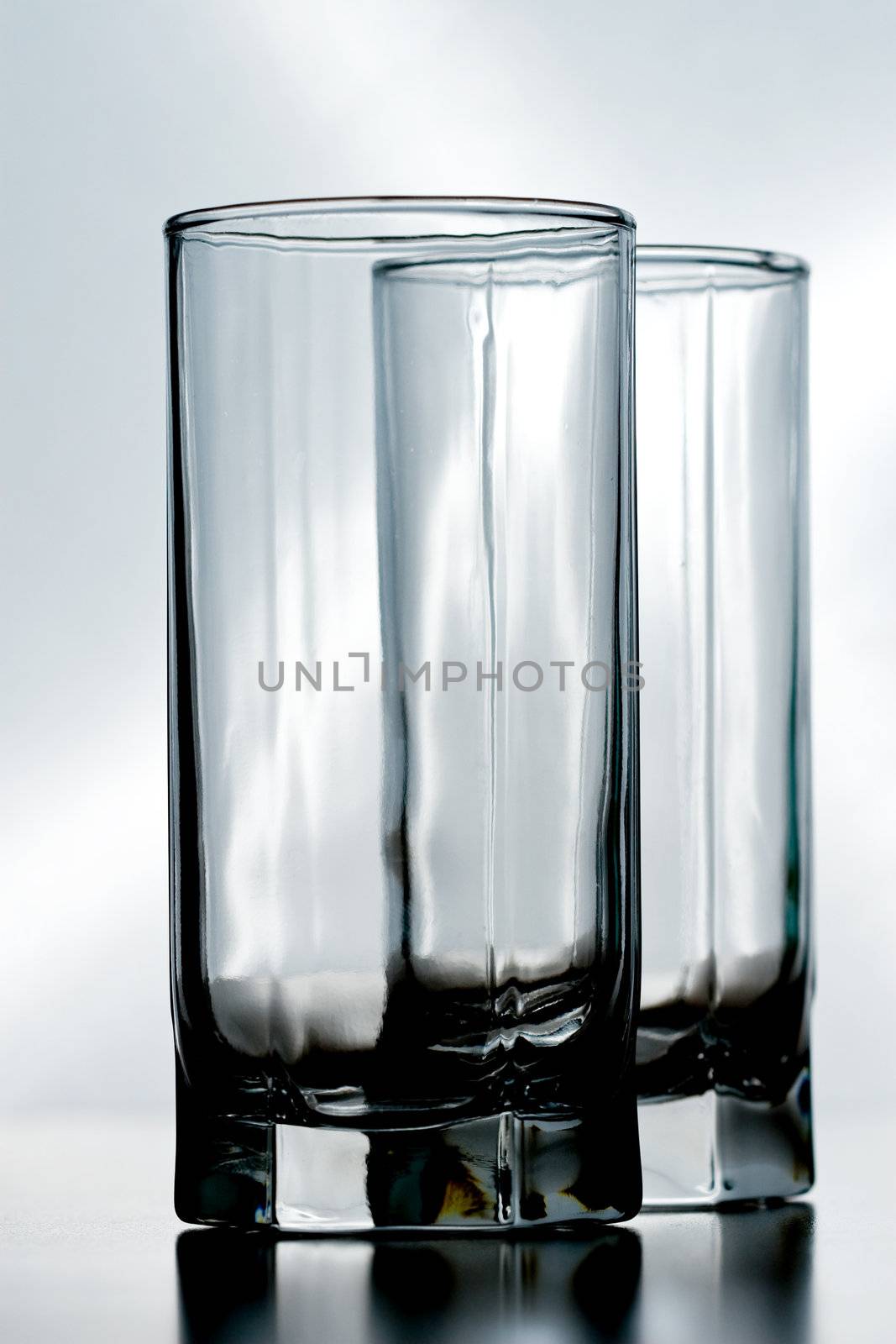 couple of empty crystal glasses