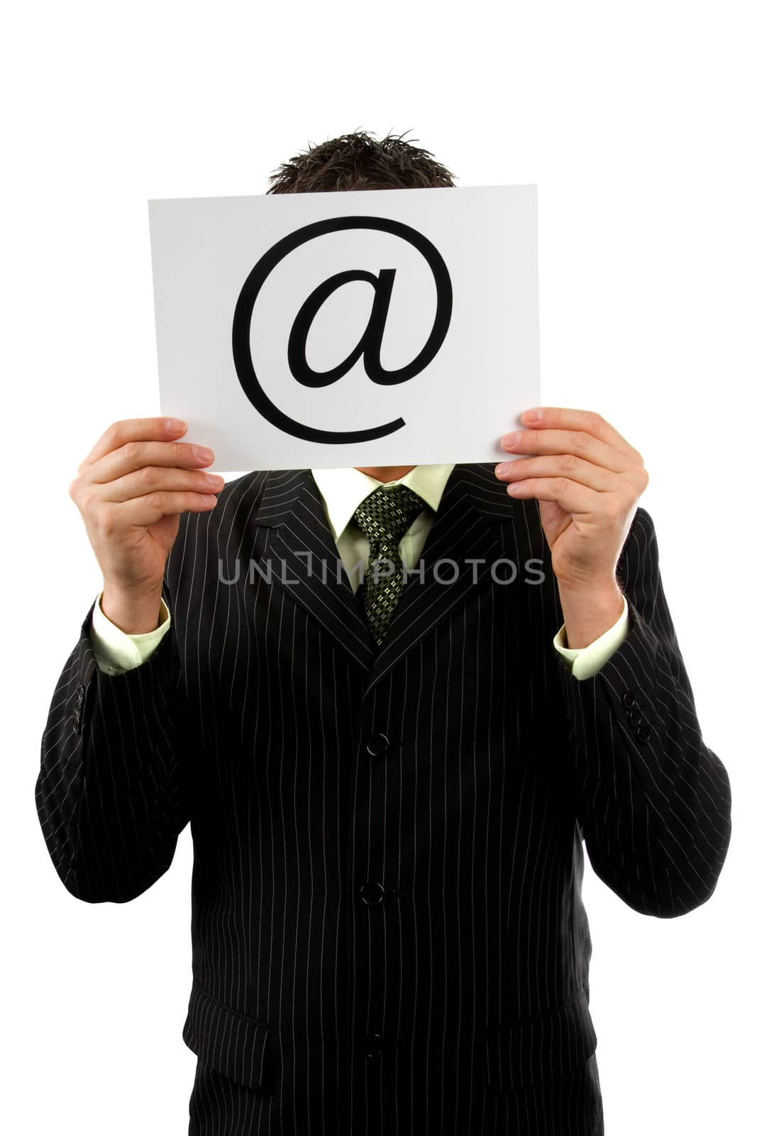 Businessman is holding a at sign, isolated on white background