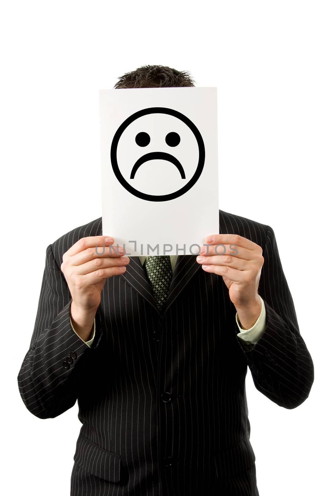 Businesman is holding a sad smilie