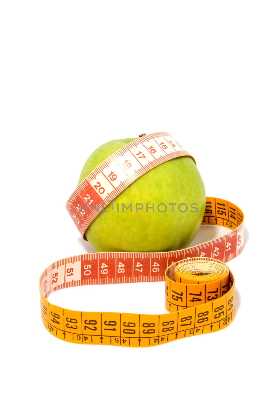 Apple with measure tape isolated on white background