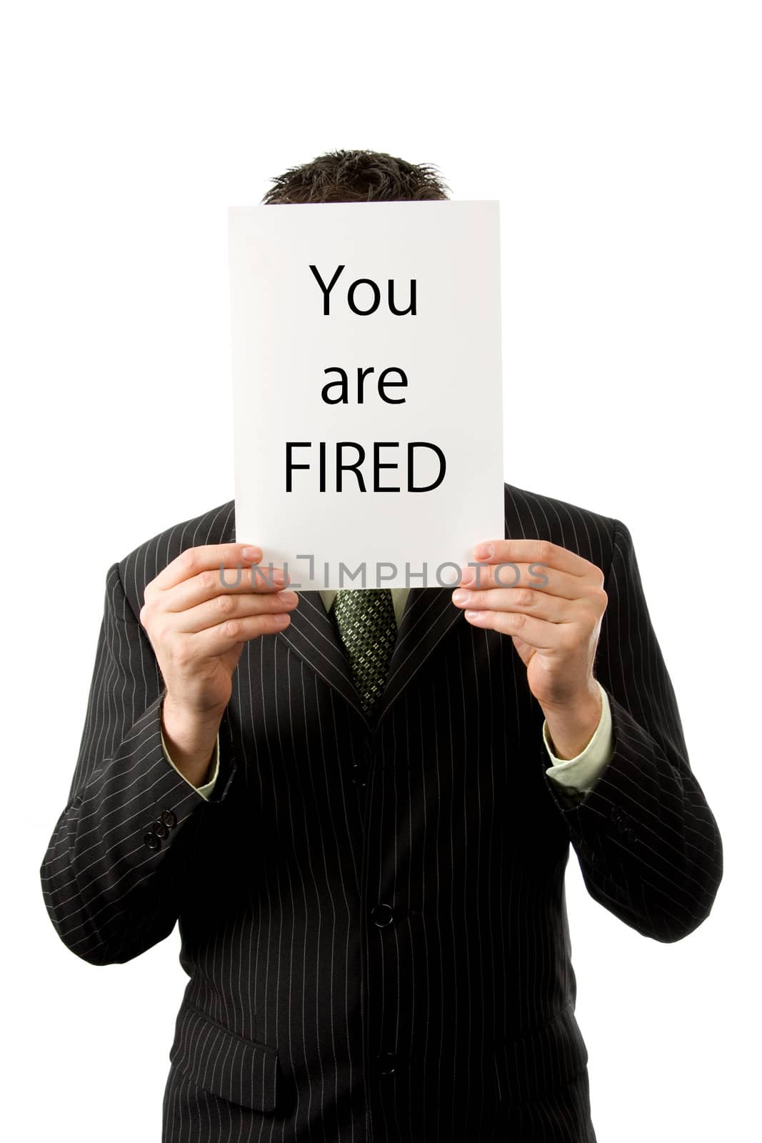 businessman is holding a text board: You are fired!
