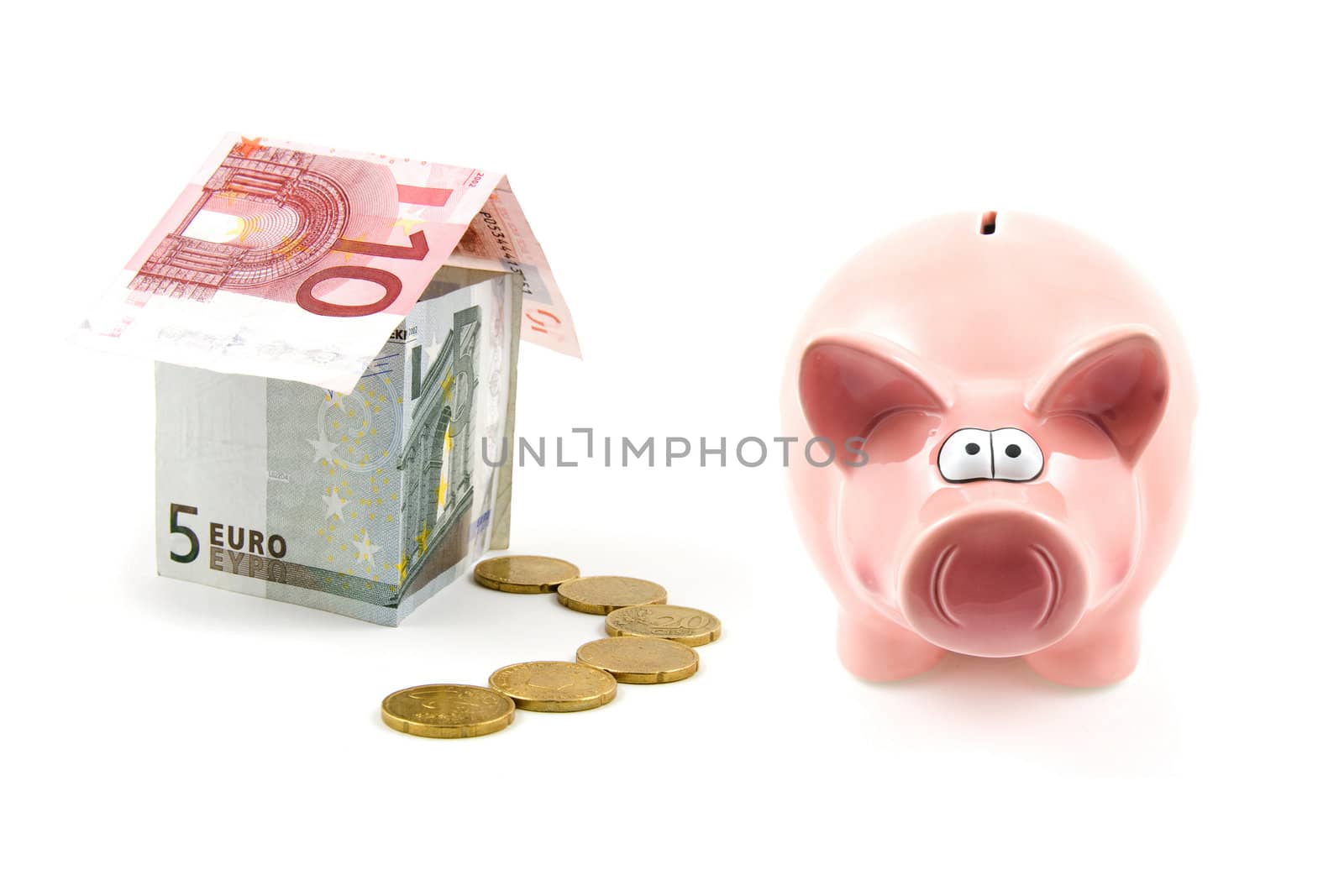 piggy bank and house of banknotes by sannie32
