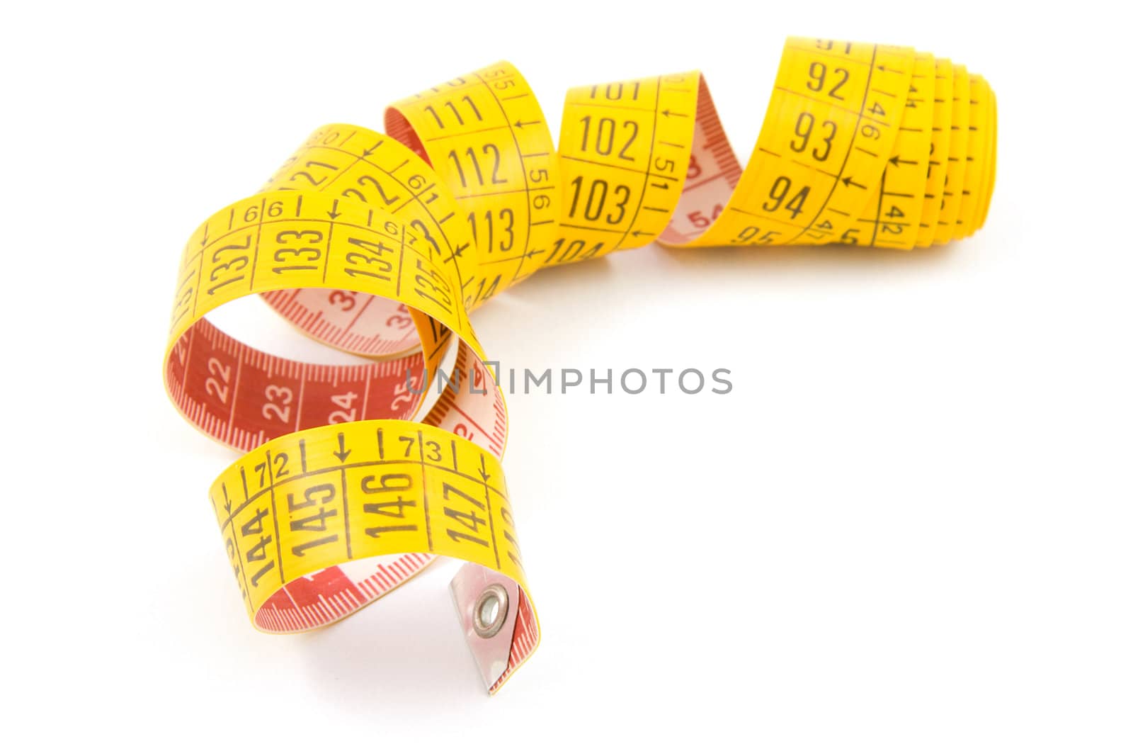 Yellow measure tape isolated on white background