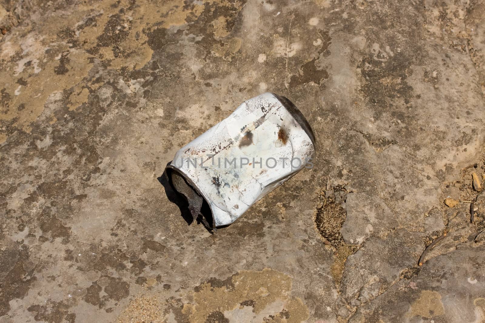 Old tin can lying on the floor
