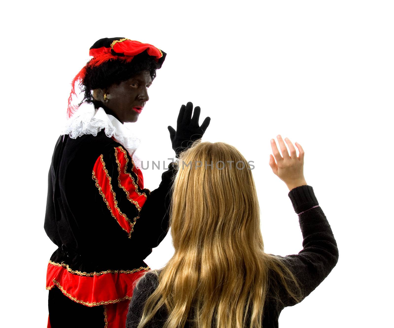 Blonde girl waves goodbye to Zwarte piet ( black pete) typical Dutch character part of a traditional event celebrating the birthday of  Sinterklaas in december over white background