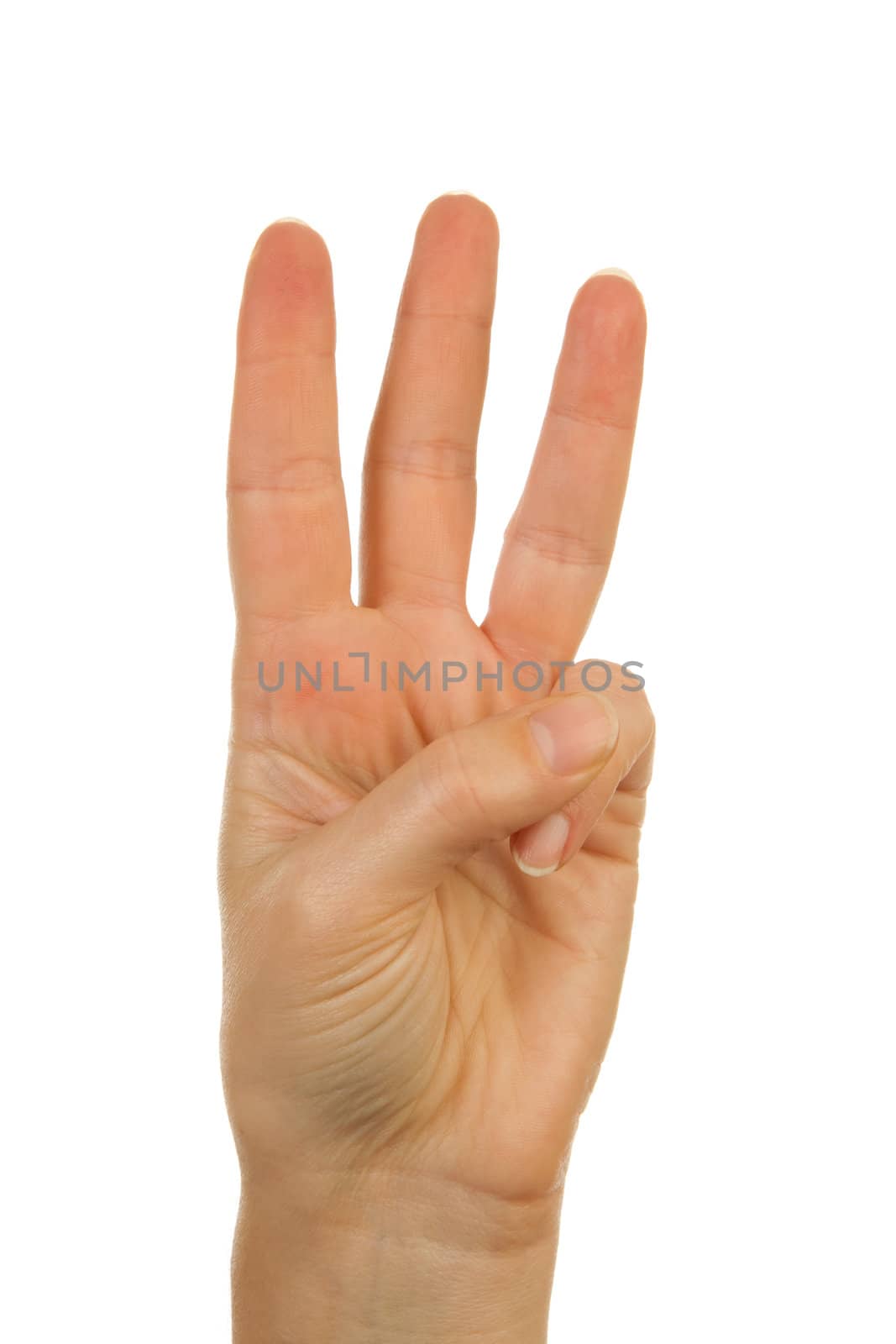 Woman's hand counting number 3 over white background