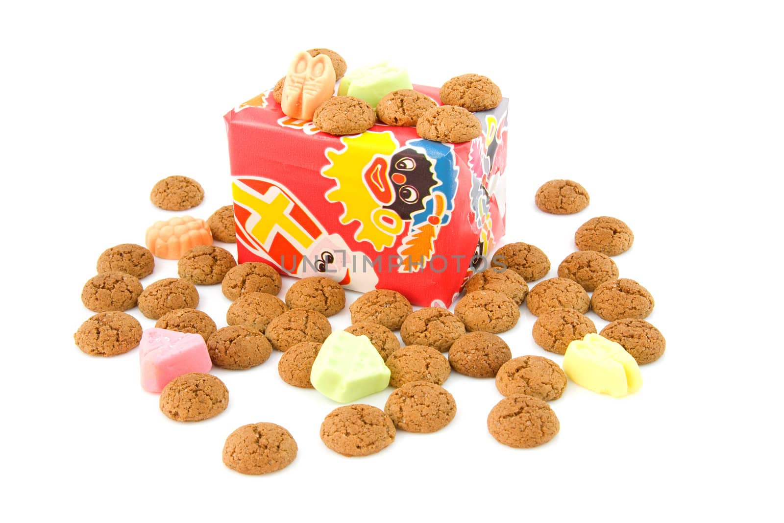 Typical dutch sweets: pepernoten (ginger nuts) and present for a celebration at 5 december in the Netherlands