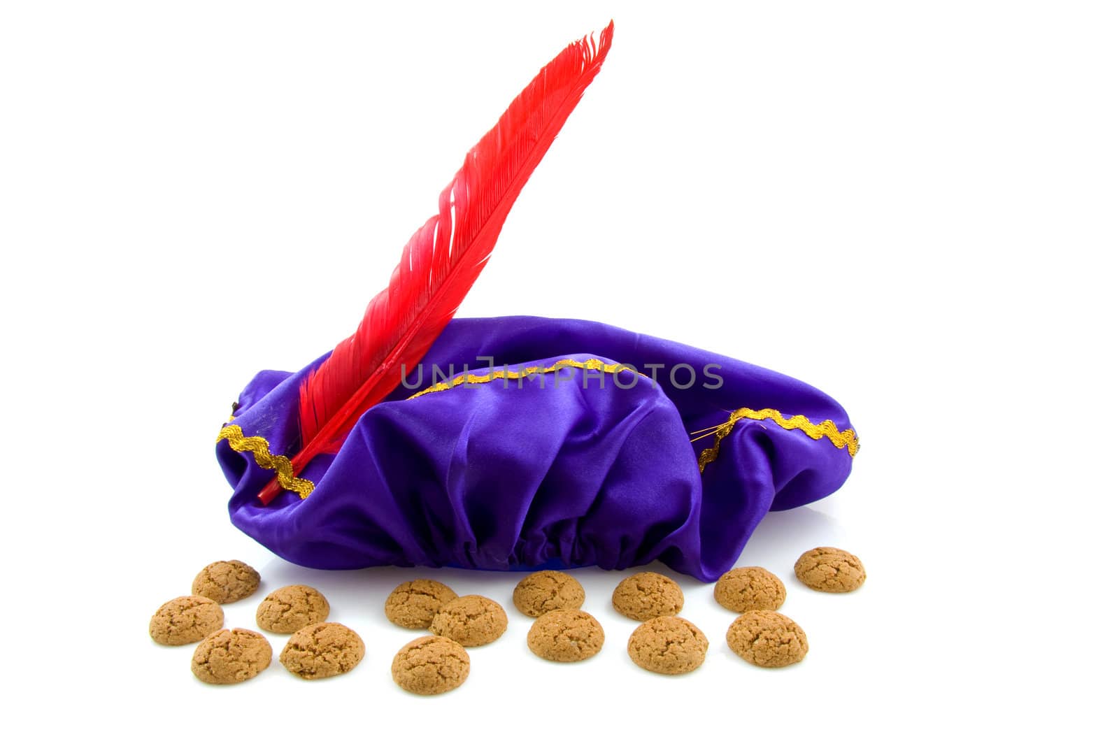 purple hat with red feather of Zwarte Piet and ginger nuts, typical Dutch event in december