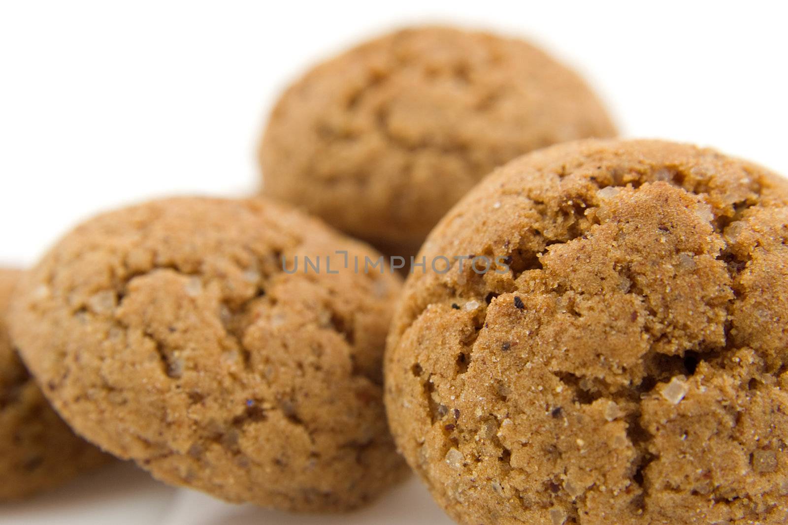 pile of pepernoten (ginger nuts) in closeup, sweets for typical Dutch festivity at 5 december