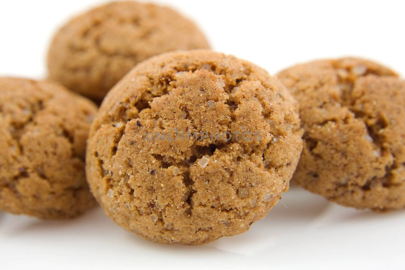 pile of pepernoten (ginger nuts) in closeup, sweets for typical Dutch festivity at 5 december