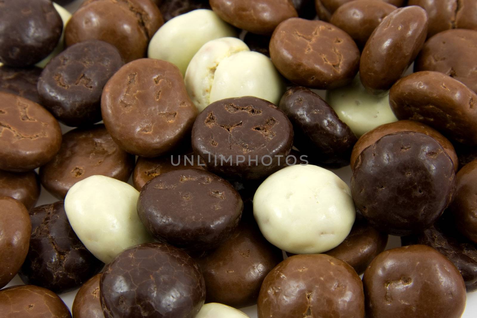 chocolate gingernuts, pepernoten, in closeup. Tyical Dutch candy for 5 december.can be used as background