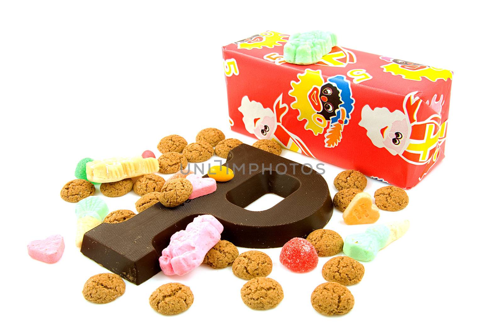Typical Dutch event: Sinterklaas in december with present and candy over white background