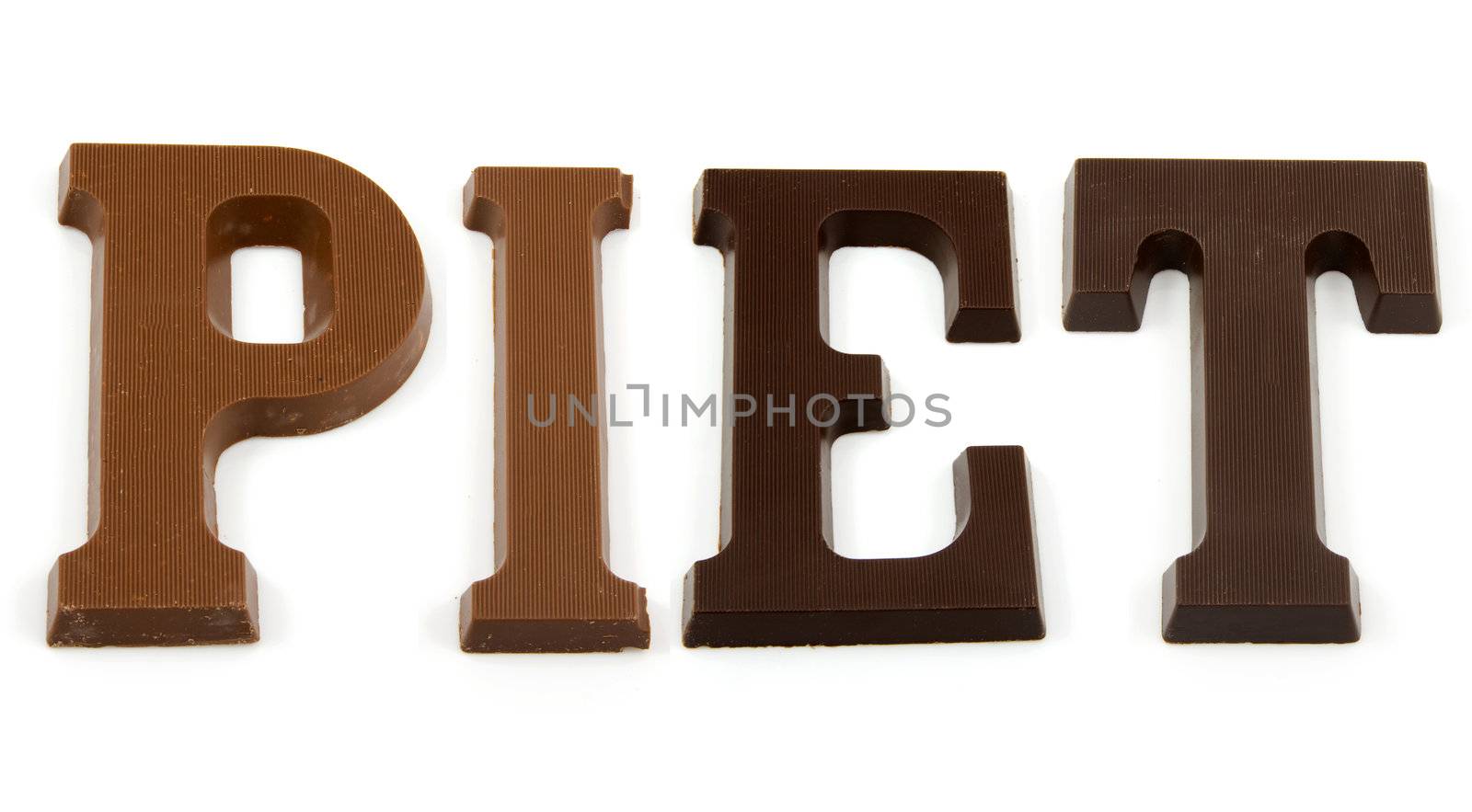 The word "PIET" in chocolate letters isolated on white background, typical Dutch candy for Sinterklaas event in december