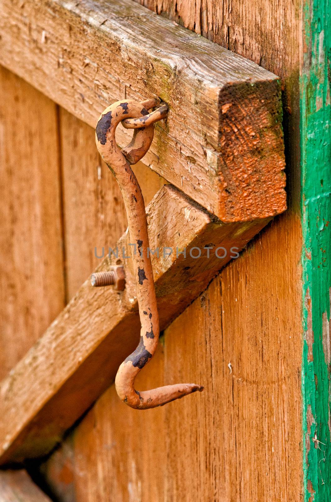 on wooden doors the old lock hook close-up by Zhukow