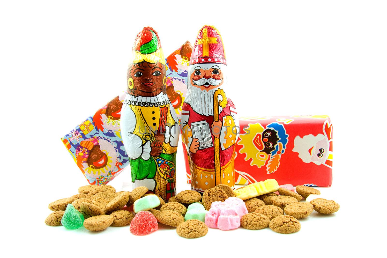Chocolate black pete ( zwarte piet) and sinterklaas ( santa claus), candy for a tradiotional event in the Netherlands, over white background