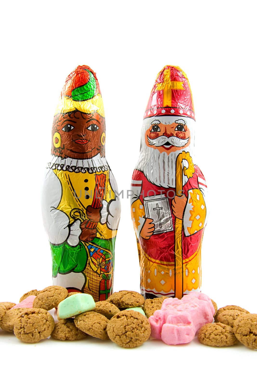 Chocolate black pete ( zwarte piet) and sinterklaas ( santa claus), candy for a tradiotional event in the Netherlands, over white background