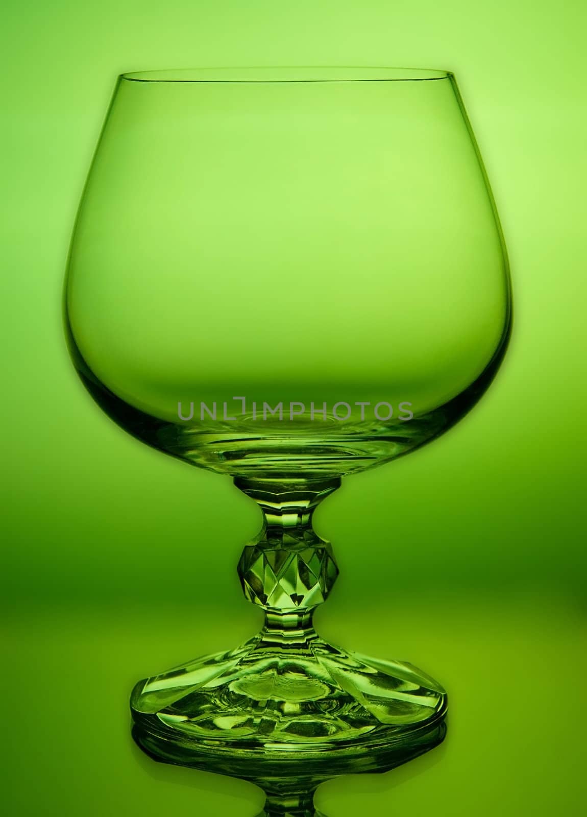 abstract green wineglass and background by Zhukow